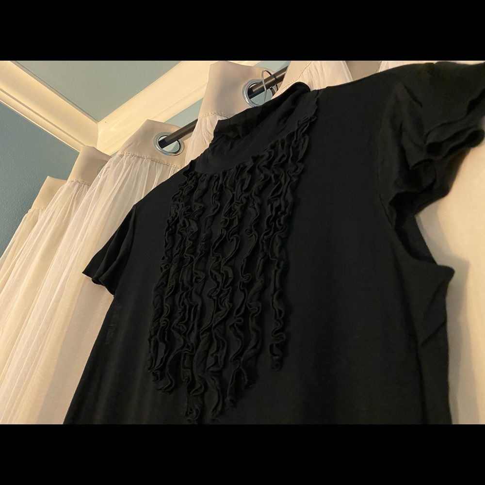 Ruffled, mock neck, flutter sleeve top. L
